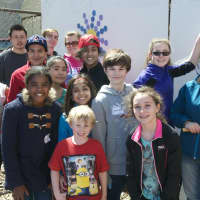 <p>Students, parents and guardians chipped in to rebuild the Cedar Street Park. </p>