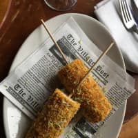 <p>Corn-on-a-stick wrapped in Funyuns.</p>