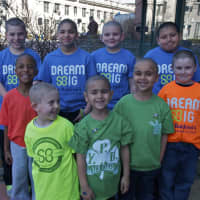 <p>Montessori School students show off shaved heads for a good cause.</p>