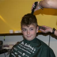 <p>Yonkers Mayor Michael Spano&#x27;s son, Christopher, gets his head shaved for charity.</p>