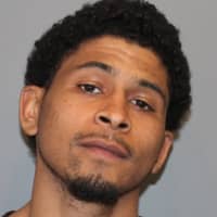 <p>Shakha Moore, 21, was charged with assault on a peace officer, interfering with an officer and a number of drug charges Monday.</p>