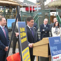 <p>Standard Amusements co-founder Nicholas Singer, center, with County Executive Rob Astorino in 2015 when a 30-year management lease agreement was proposed at the county-owned Rye Playland Amusement Park.</p>