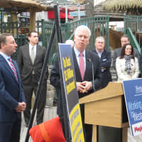 <p>Westchester Board of Legislators Chairman Michael Kaplowitz, center, has 60 days to get his board to endorse the deal proposed by County Executive Rob Astorino.</p>