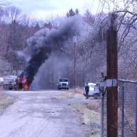 <p>Firefighters arrived on the scene to fight the fire against a tractor trailer crash. </p>