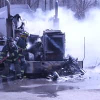 <p>Firefighters knock down the fire and go after hot spots.</p>