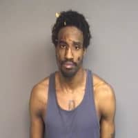 <p>Rasheed Hines, 31, of Orlando Avenue was charged in connection with a foot pursuit after he allegedly threw a cement block at a police vehicle in front of police headquarters Wednesday morning.</p>