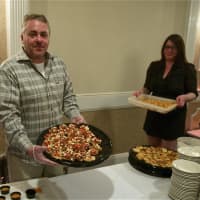 <p>Rick, owner of Rick&#x27;s Seafood and Char in Mahopac, holds a tray of tasty appetizers.</p>