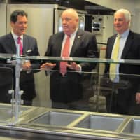 <p>New Covenant House Executive Director John Gutman, Ernie Anastos, Al Barber, president of Catholic Charities and Paul Harinstein, chairman of the board, New Covenant House, tour the soon-to-open expanded New Covenant House facility in Stamford.</p>