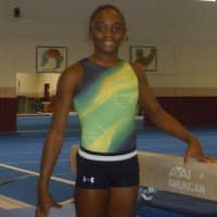 <p>Stamford gymnast Carlee Reid won state championships in Level 8 on balance beam and all-around.</p>