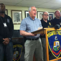 <p>Capt. Richard Conklin speaks during the press conference announcing two murder arrests while investigators from left: Officer Jerry Junes, Sgt. Anthony &quot;Butch&quot; Lupinacci and Eddie Davis look on.</p>