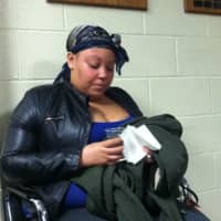<p>Dijona Wilson, sister of the late Darius Jones, speaks following a police conference about the arrest of the two men charged with killing her brother in 2012.</p>