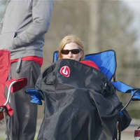 <p>Fans stayed warm on a windy day.</p>