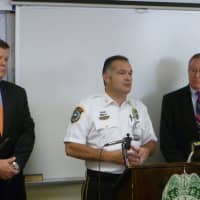 <p>Wilton Police Chief Michael Lombardo, left, speaks during an August 2012 press conference to announce the arrest of a juvenile in connection with the 2008 death of 13-year-old Nicholas Parisot. </p>