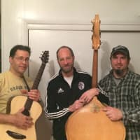 <p>The North Tarrytown All Stars are Ahmed Kharem on drums,guitar and vocals,  Tom Schumacher on guitar and vocals and Neil Jacobson on upright bass. </p>
