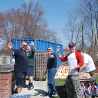 <p>Yorktown residents cook hot dogs and hamburgers at the event. </p>