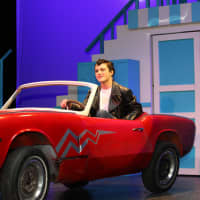 <p>A John Jay student plays the role of Danny Zuko in &quot;Grease.&quot;</p>