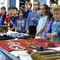 <p>Third-graders marvel and learn more about Kenyan culture.</p>