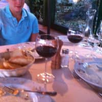 <p>Enjoying a meal in Tuscany.</p>