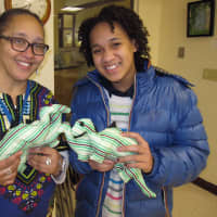 <p>Gina Levon Simpson, with Leah Attai, right, a graduate of the Children&#x27;s Leadership Training Institute in Bridgeport, who made stuffed toys to donate to children. </p>