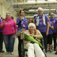 <p>Fifty-year cancer survivor Dorothy Holland leads the parade of survivors. Holland was diagnosed with breast and ovarian cancer in 1964.</p>