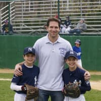 <p>Yankees coach Josh Duitz, with sons Jack and David.</p>
