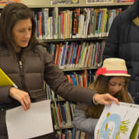 <p>Cross River resident Michelle McPartland with her 6-year-old daughter, Cara, at the Lewisboro Library&#x27;s new children&#x27;s room.</p>