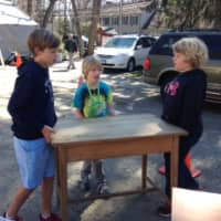 <p>The Darien Boy Scouts prepare for the 43rd annual Giant Tag Sale at the Scout Cabin on Sunday.</p>