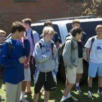 <p>Darien High students watch friends try out &quot;The Convincer.&quot;</p>