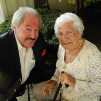 <p>Millie Russo and her son, Tony Russo, celebrate her 100th Birthday.</p>