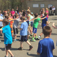 <p>The students got a couple conga lines started as they danced to raise money for the Obie Harrington-Howes Foundation.</p>