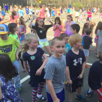 <p>Darien kids rock out during the Groove-a-thon.</p>