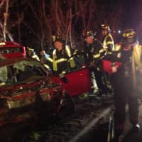 <p>Fairfield Fire Department at work at the scene of the fatal rollover on I-95. </p>