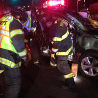 <p>Fairfield Fire Department at work at the accident scene on Black Rock Turnpike. </p>