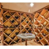 <p>A wine cellar is one of the many features in the property at 39 Rock Meadow Lane in Stamford.</p>