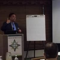 <p>Carlos Reinoso Jr. of the Human Services Council in Norwalk speaks at a conference in Seattle on problem gambling.</p>