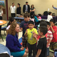 <p>U.S. Rep. Elizabeth Esty visits with students at the supper program at Ellsworth Avenue Elementary School in Danbury.</p>