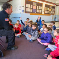 <p>Croton-Harmon first-graders at Carrie E. Tompkins Elementary School recently met with Croton-on-Hudson Police Det. Paul Camilleri to learn about officers roles in the community and how to stay safe. </p>