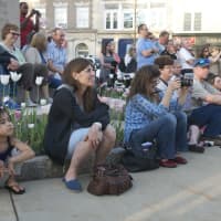 <p>Crowds gather to watch performances on Greenwich Avenue.</p>
