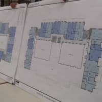 <p>Floor-plan photos for affordable-housing units in the Chappaqua Crossing building are presented at a New Castle Town Board meeting.</p>