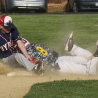 <p>Nick Schaefer of Byram Hills tags Michael Kakso out at second.</p>