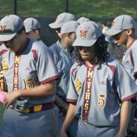 <p>Mt. Vernon players walk to dugout.</p>