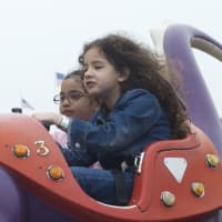 <p>Kids enjoy the rides on Playland&#x27;s opening day.</p>
