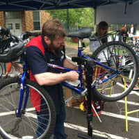 <p>A quick check on a bike before the 13th Annual Mother&#x27;s Day Bike Ride in Old Greenwich on Sunday morning.</p>
