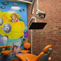 <p>This exam room is under the sea -- and includes a brick wall in the restored downtown building. </p>