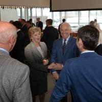 <p>Sacred Heart athletic director Bobby Valentine, right, and trustee Linda McMahon talk with guests at the ribbon cutting for the new building.</p>
