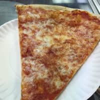 <p>A regular slice is the most popular order at Broadway North in Armonk.</p>