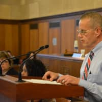 <p>Mount Kisco Police officer Kevin Reilly speaks at the Board of Legislators&#x27; meeting.</p>