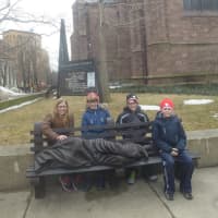 <p>A Homeless Jesus statue is installed in downtown Buffalo, N.Y.</p>