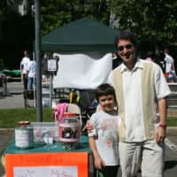 <p>Two residents host a fundraiser at Pleasantville Day. </p>