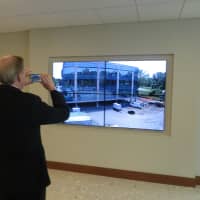 <p>A time-lapse video of the 14-month construction project was played on eight large screens throughout the new WESTMED building for patients and other visitors on Wednesday.</p>